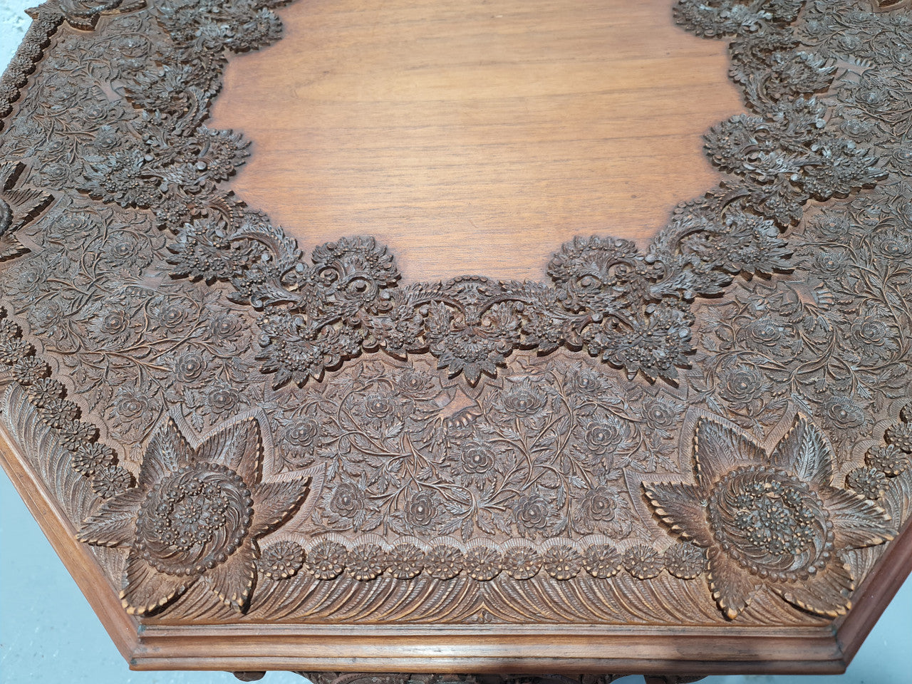 Heavily carved Teakwood round Chinese coffee table. In good original detailed condition. Circa: 1920