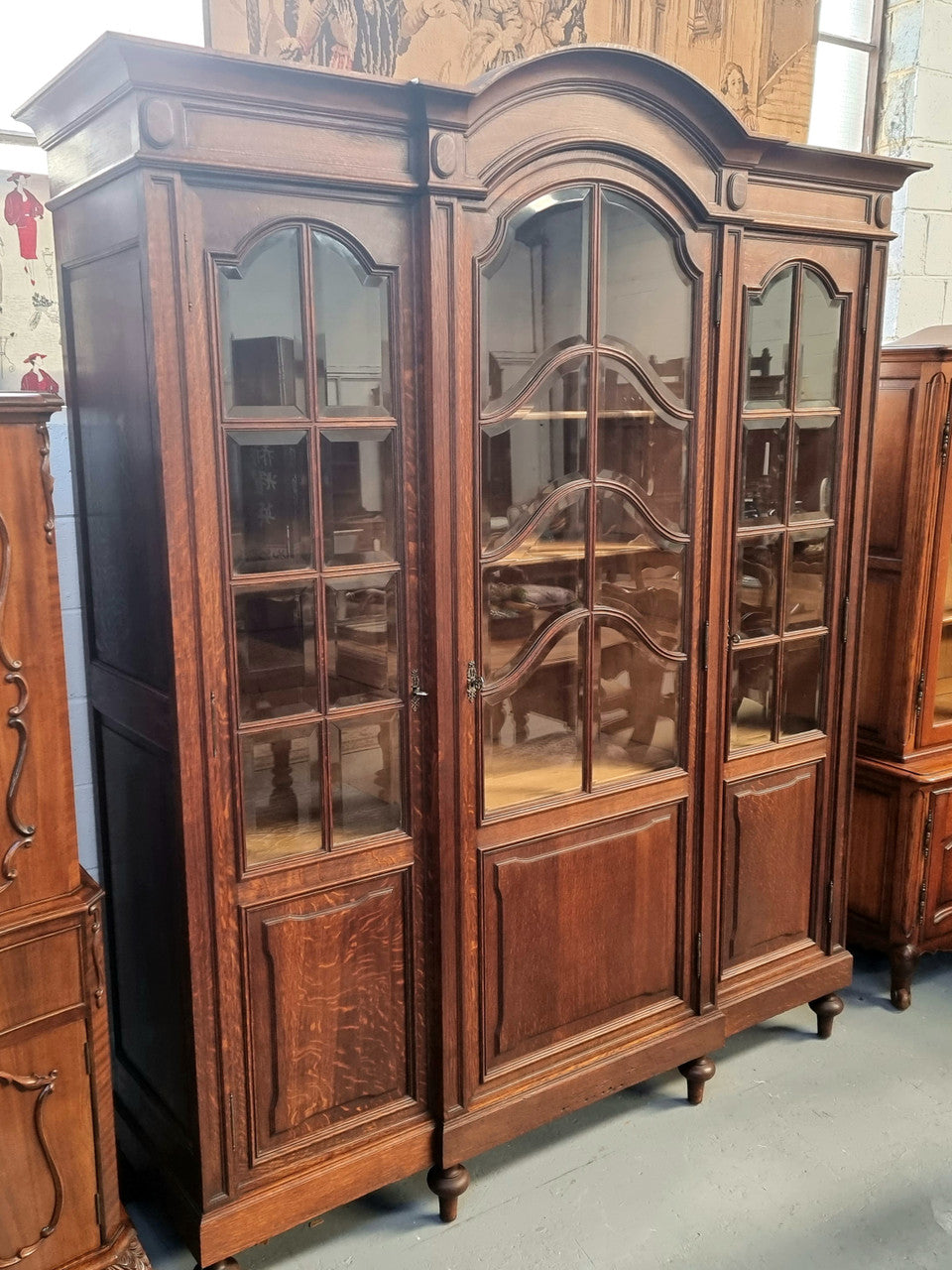 Late 19th Century French Oak three door bookcase. It has fully adjustable shelfs and is in good original detailed condition.