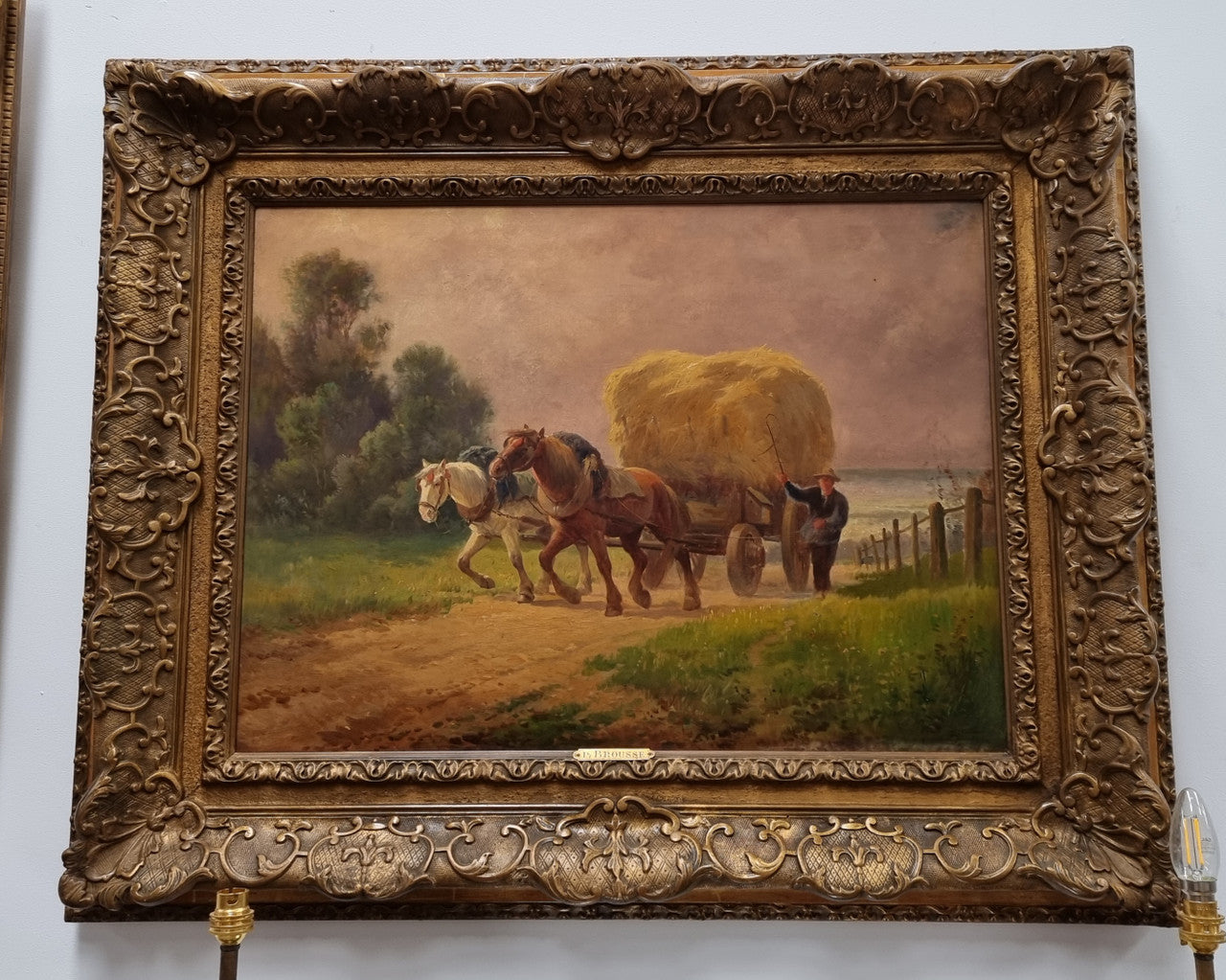 Amazing French impressionist oil on canvas of draft horses which is signed and in a lovely ornate frame. In very good original condition.