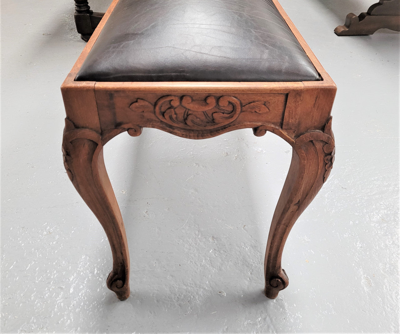 French Oak newly upholstered leather look duet stool. In good original detailed condition and new upholstery.