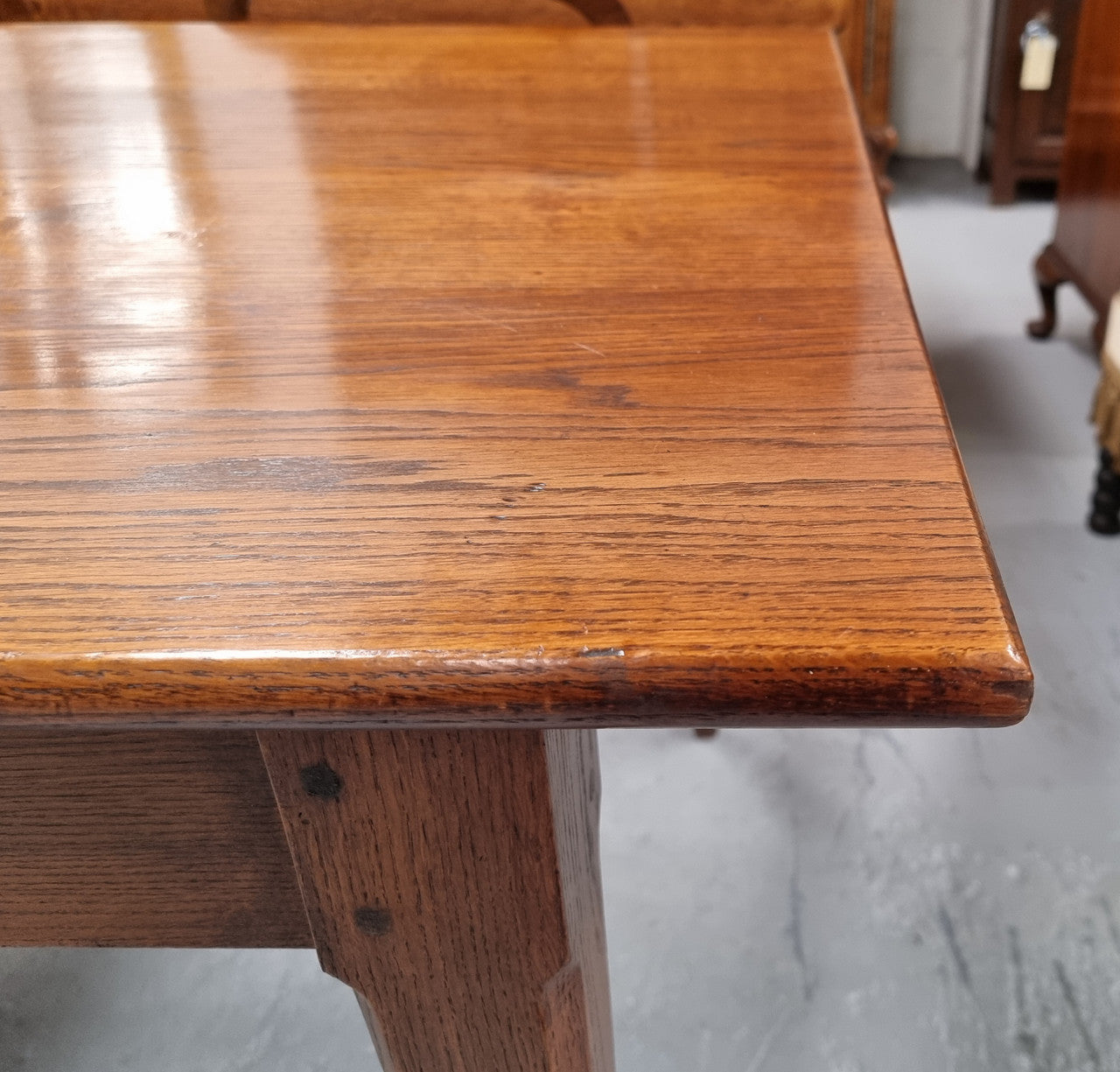 Antique French Oak Farmhouse table in fully restored condition. Features a single drawer and tapered legs.