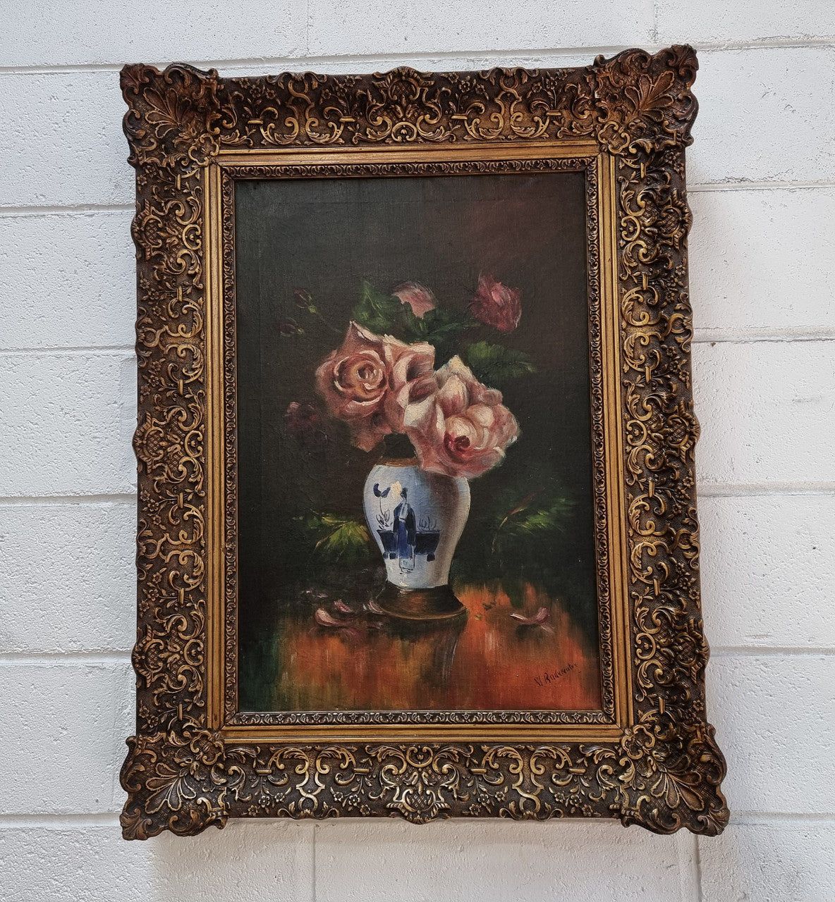 Stunning French signed floral oil on canvas painting of roses in a beautiful decorative frame and in good condition.