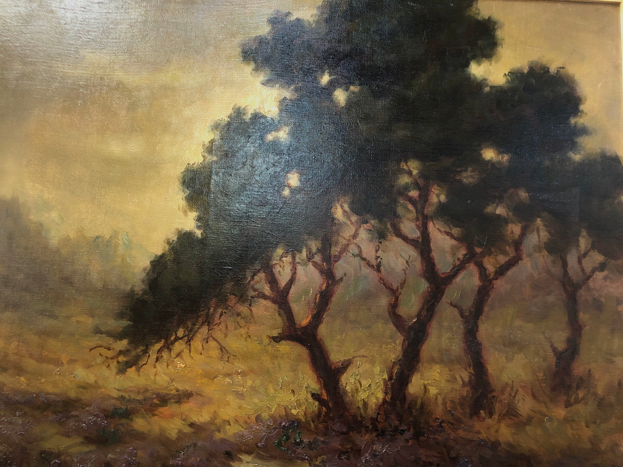 Sensational "Moody" oil on canvas landscape painting in a ornate gilt frame. In good original condition.