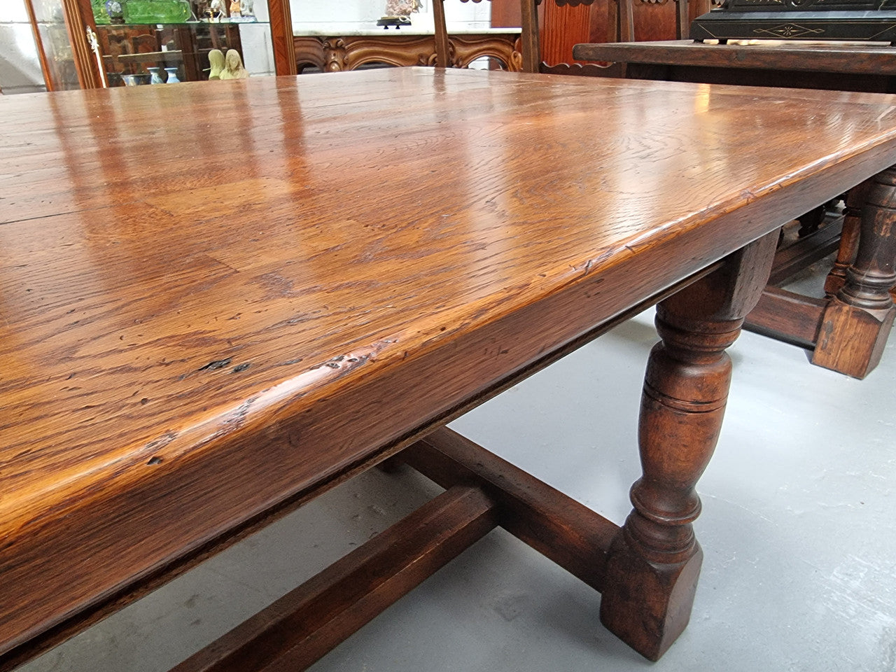 Vintage French Oak stretcher base farmhouse table. It is in good original condition.