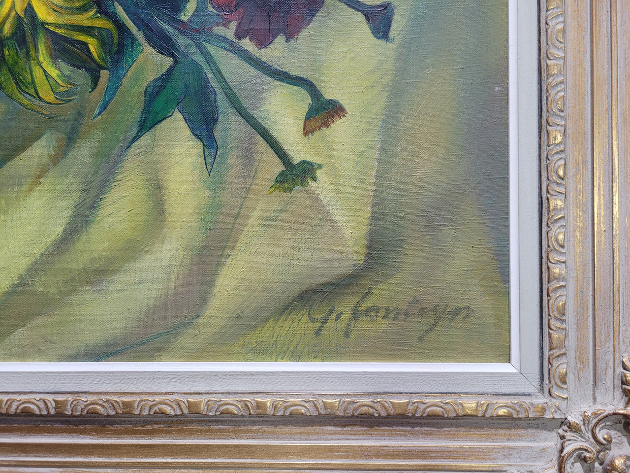 Large vibrant French oil on canvas of flowers and signed “Y.Fonteyn". In an amazing gilt frame and is in good original condition.