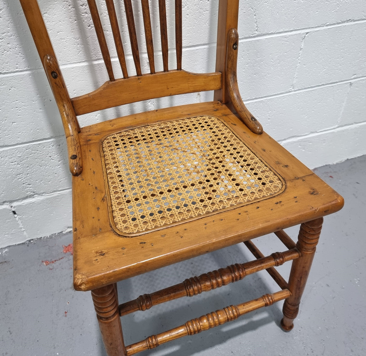 Australian Emu chair with cane inset seat. In good original condition.