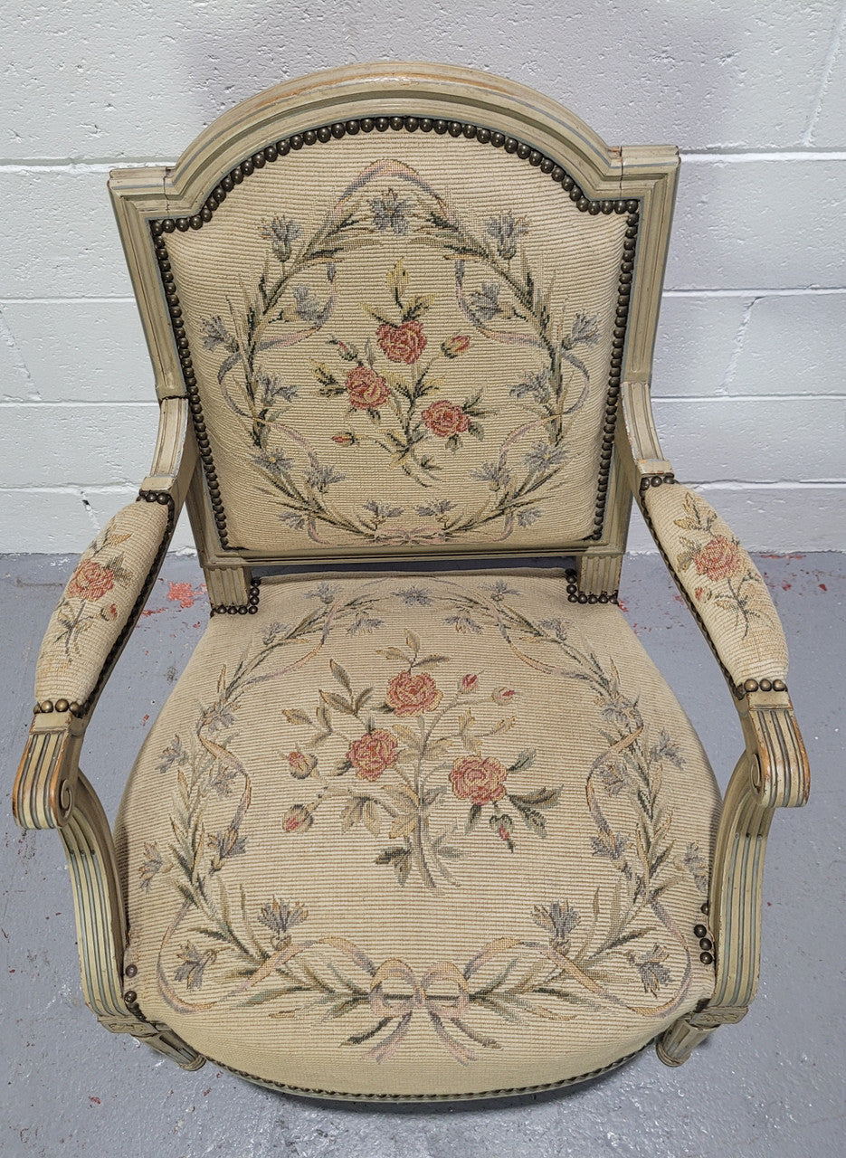 Lovely French Louis XVI style painted and Tapestry upholstered fauteuil. In good original condition, and very comfortable.