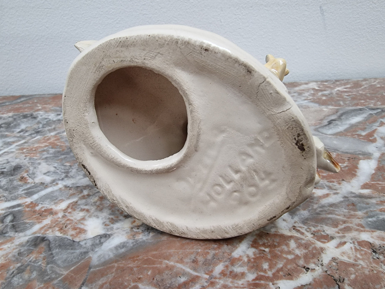 Vintage “Jema Holland” ceramic fish and snail statuette.