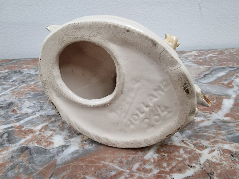 Vintage “Jema Holland” ceramic fish and snail statuette.
