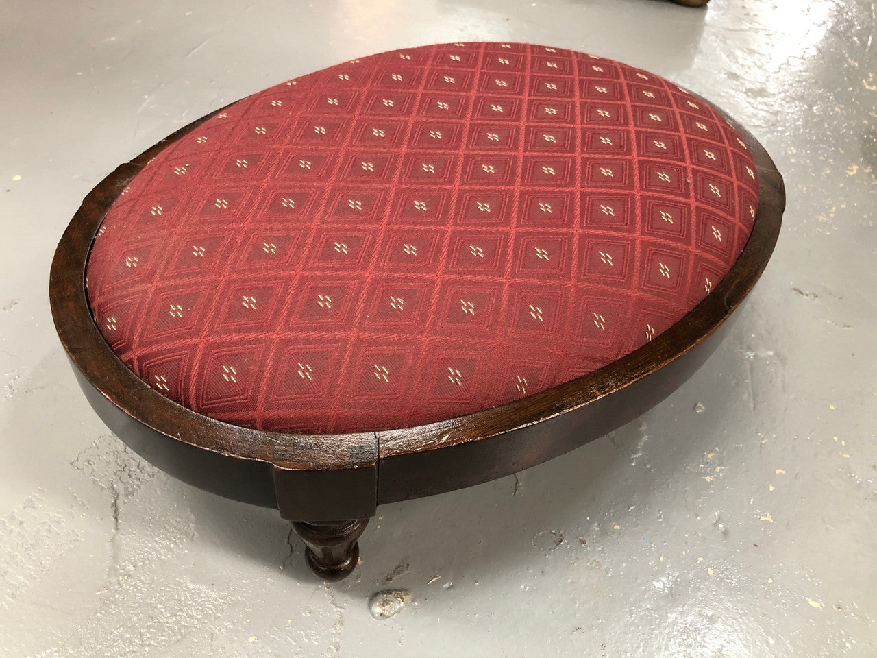 Upholstered Antique Mahogany oval foot stool. In very good original condition.