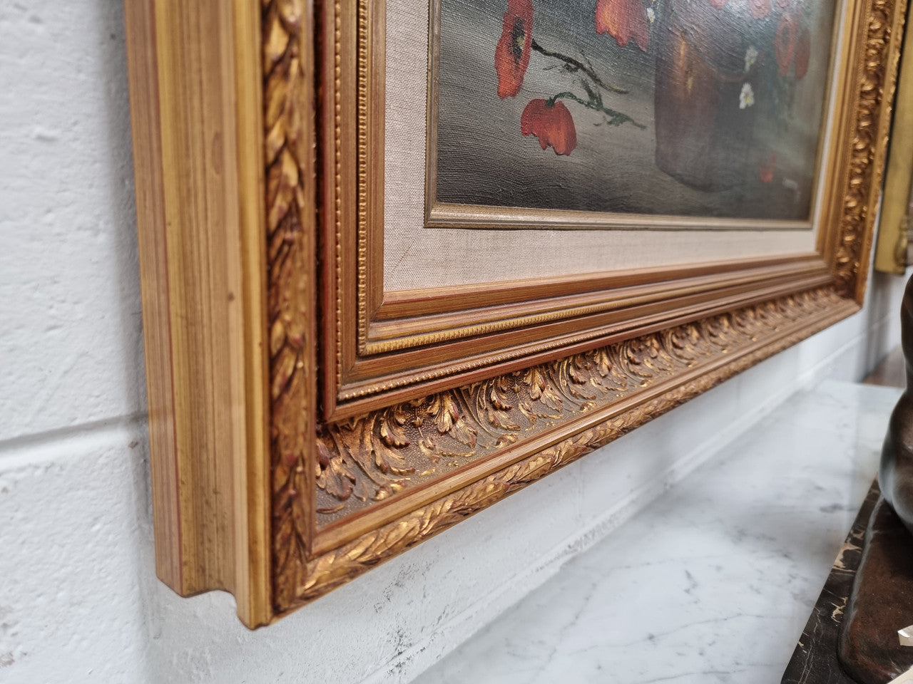 Lovely Vintage signed floral oil on canvas of Poppies and Daisy's and in a decorative gilt frame . In good original detailed condition.