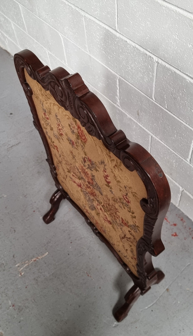 Attractive Carved Wooden Framed Fire Screen featuring Tapestry. In good detailed condition.