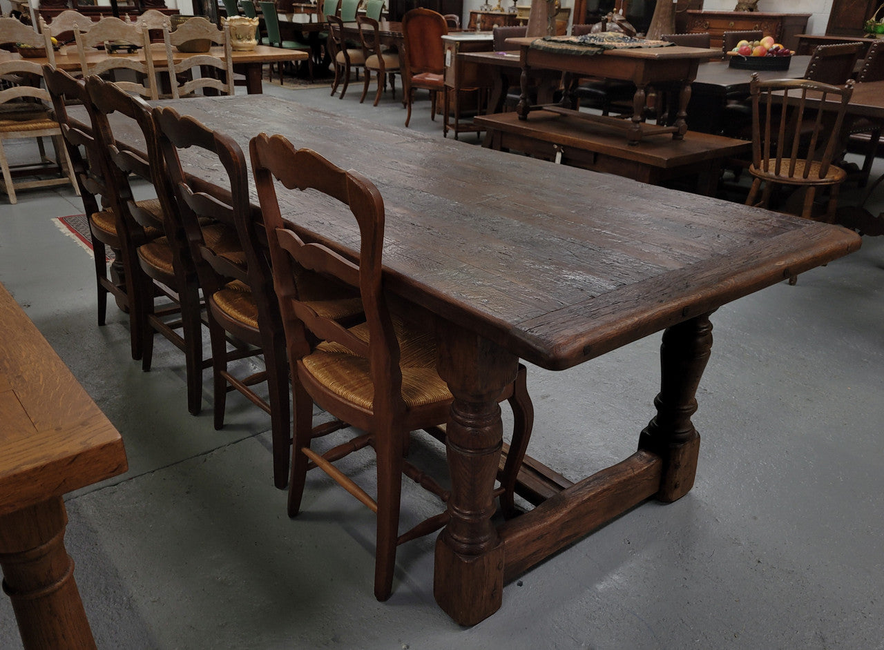 Amazing 2.65 meter French Elm Refectory dining table with loads of rustic charm. This table has been sourced from France and can comfortably seat ten people. It is in good original detailed condition.