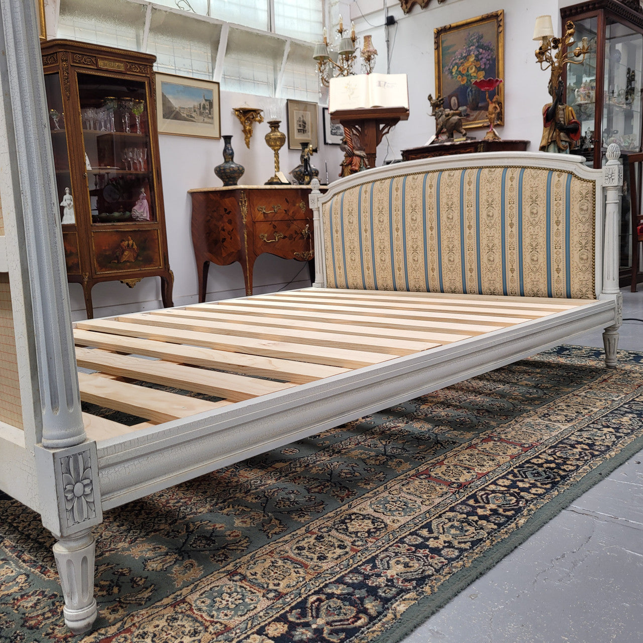 French Louis 16th style double bed and rails with original crackle paint. It also has good quality upholstery. Bed comes complete with custom made slats. Just place your mattress on top. Sourced from France and in good original detailed condition.