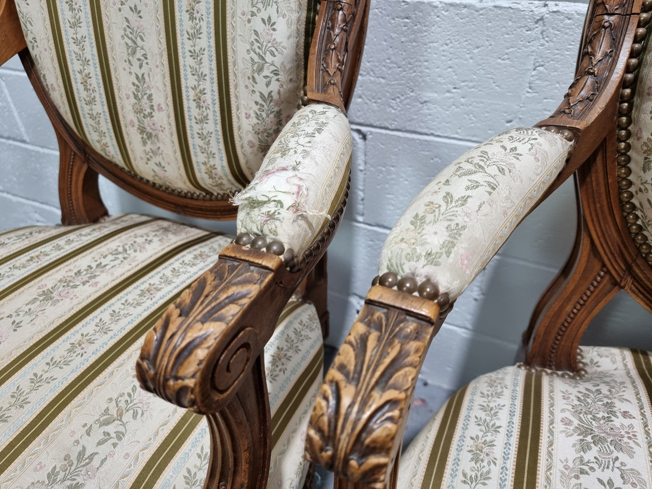 Pair of French Louis XV matching carved armchairs. They are in good overall condition with some slight wear to fabric, please view photos as they help form part of the description.