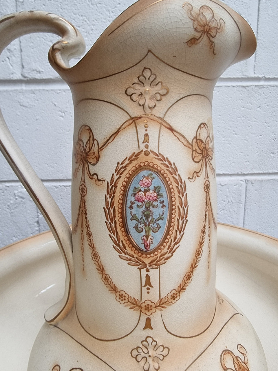 Charming large Crown Devon jug and basin set. Muted colors featuring garlands and floral medallions “Festoon Pattern” No chips or cracks in good condition commensurate with age