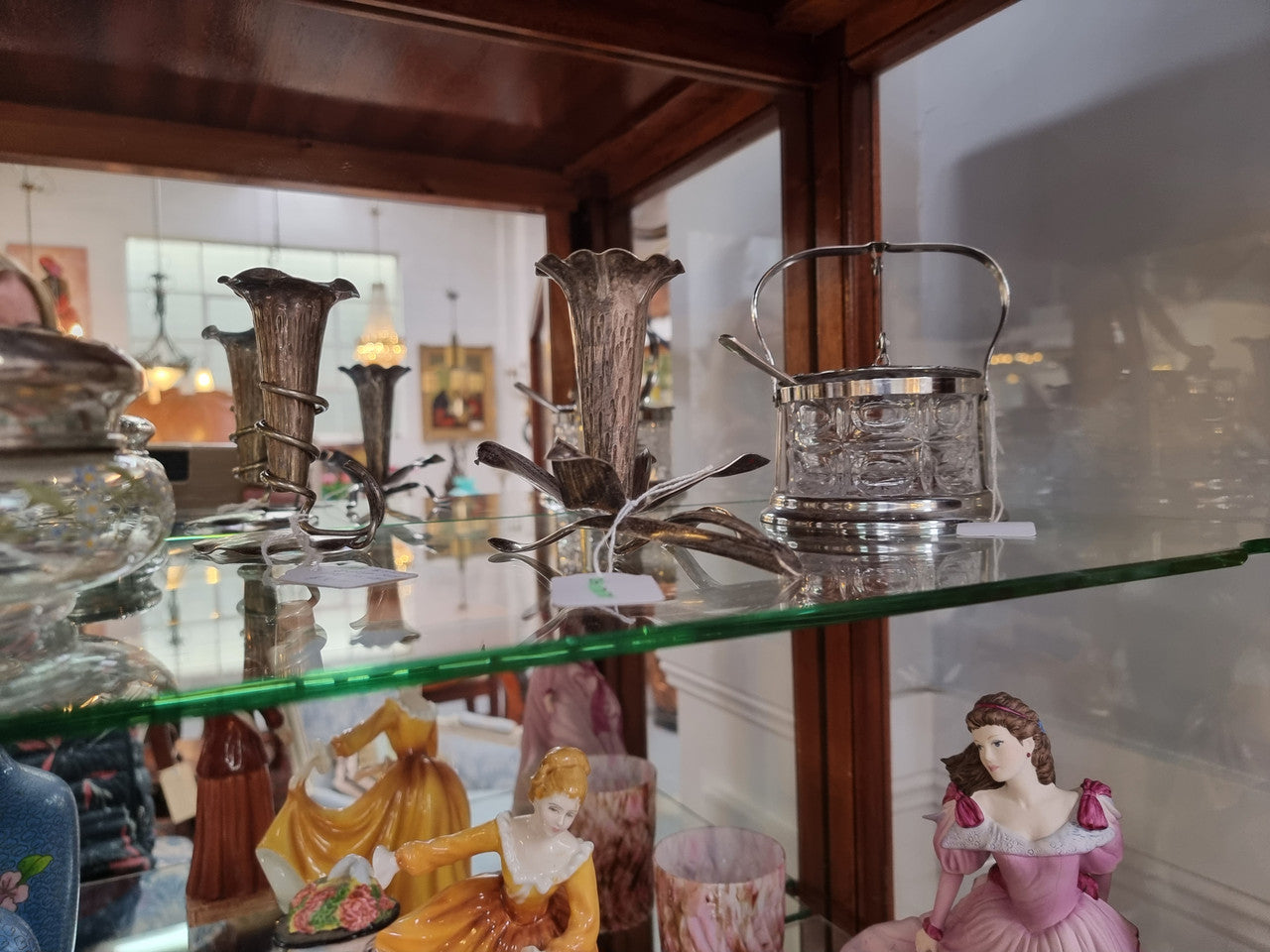 Beautiful French walnut inlaid vitrine with a lovely marquetry design and ormolu mounts. Has a beautiful coloured marble top and two glass shelves. In good original condition.