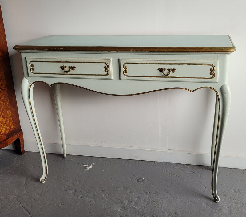 Vintage French Louis 15th style original painted and gilded highlights two drawer console table. It has been sourced from France and is in good original condition.