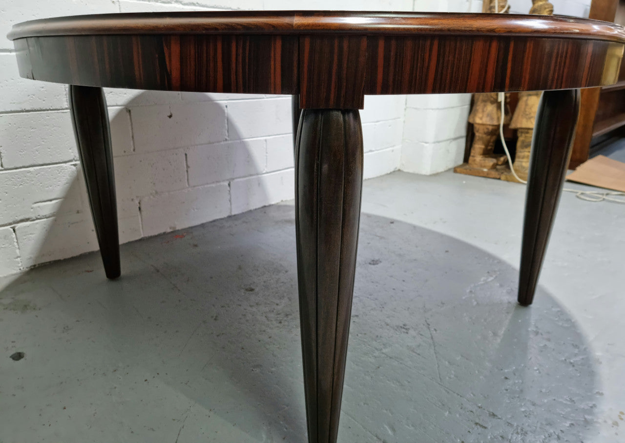 French Art Deco Macassar Ebony circular dining table by "Jules Leleu". In very good original detailed condition.