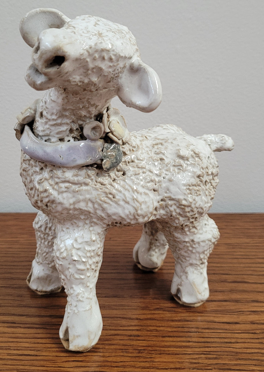 Hand Made Glazed Terra Cotta Sheep signed “Giel”. In good condition.