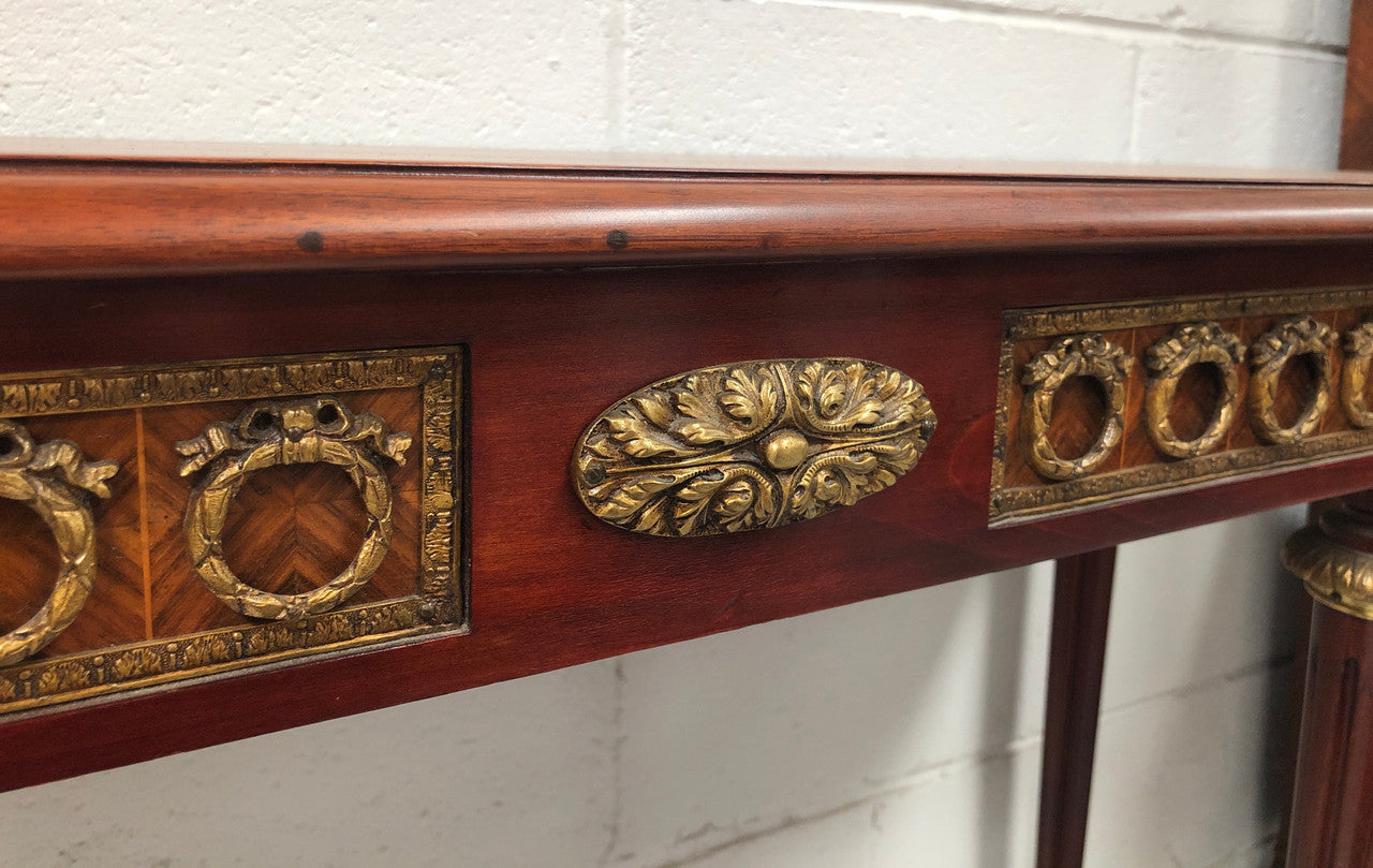 Fully restored decorative French style mahogany console table, with beautiful ormolu mounts and in very good condition.