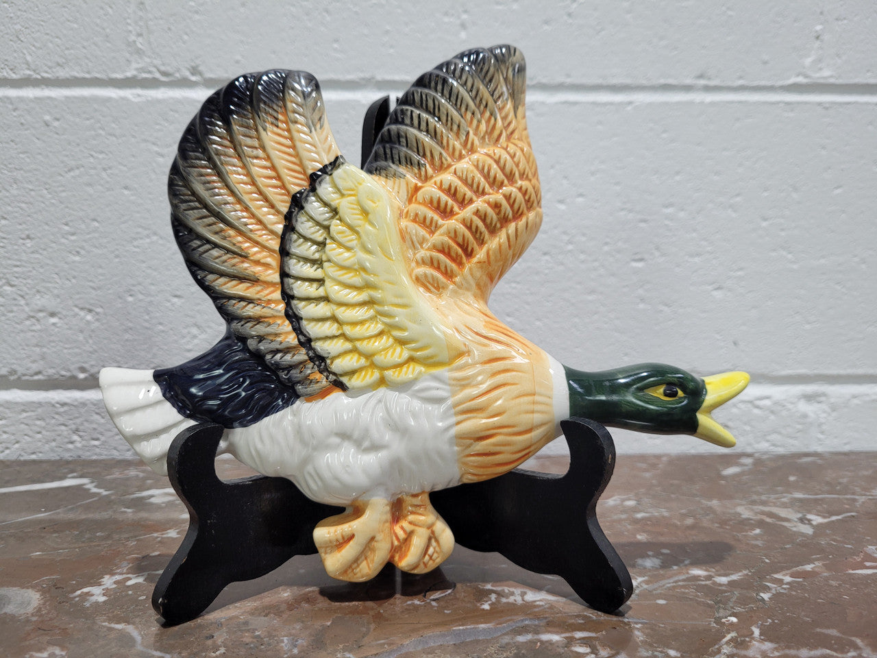 Set of three Vintage wall hanging flying ducks. In good original condition with crazing but no cracks or chips. Please view photos as they help form part of the description.