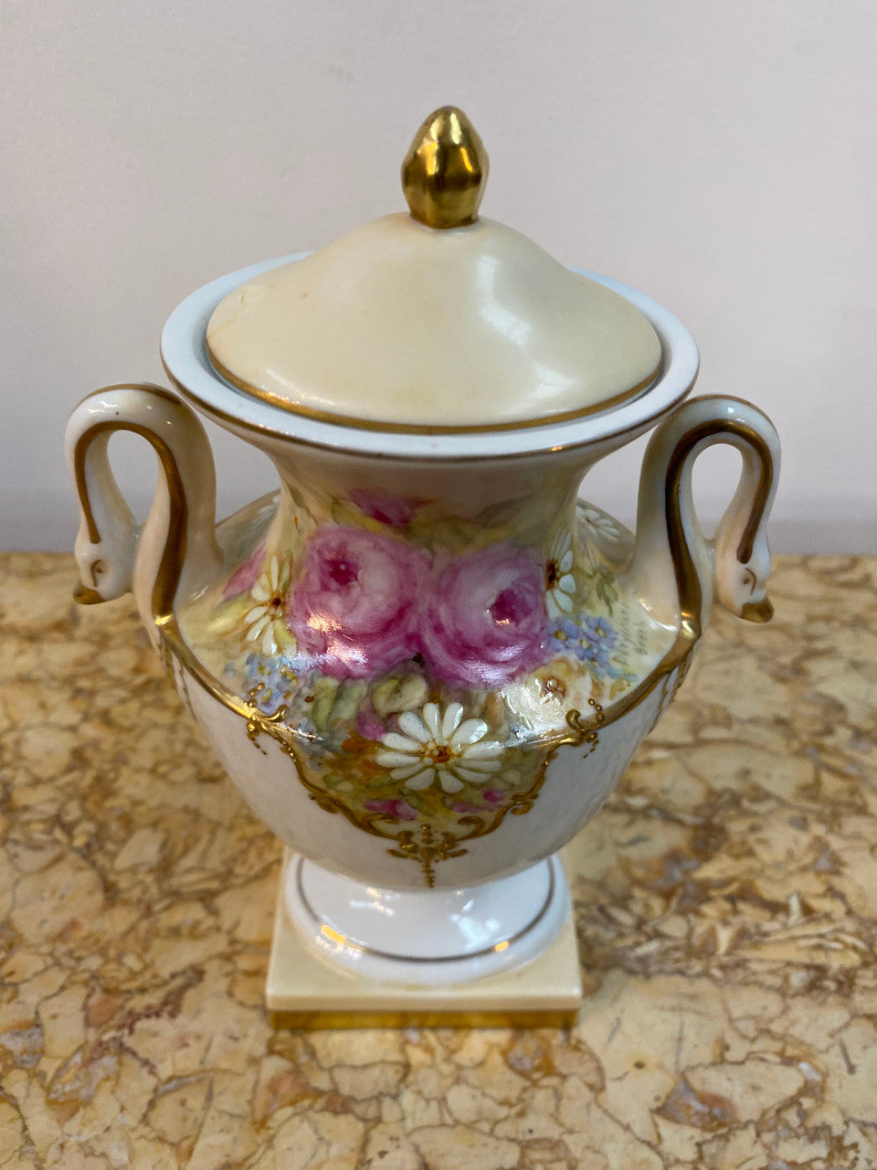 SIgned hand painted Portugal china lidded urn vase with swan handles.