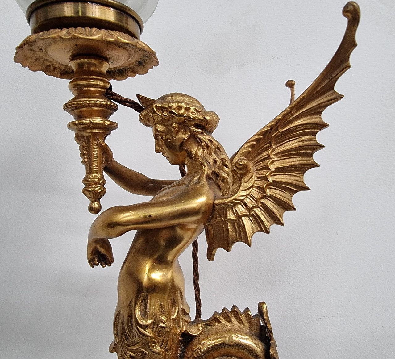 Decorative and beautiful is this 19th Century Ormolu table lamp with a lovely frosted frame and in good working order.