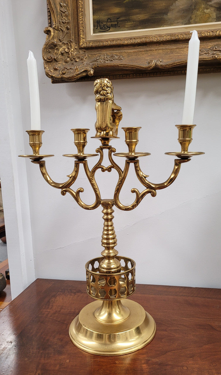 Pair of large Antique French Brass candelabras with lions. They have been sourced from France and are in good original detailed condition.