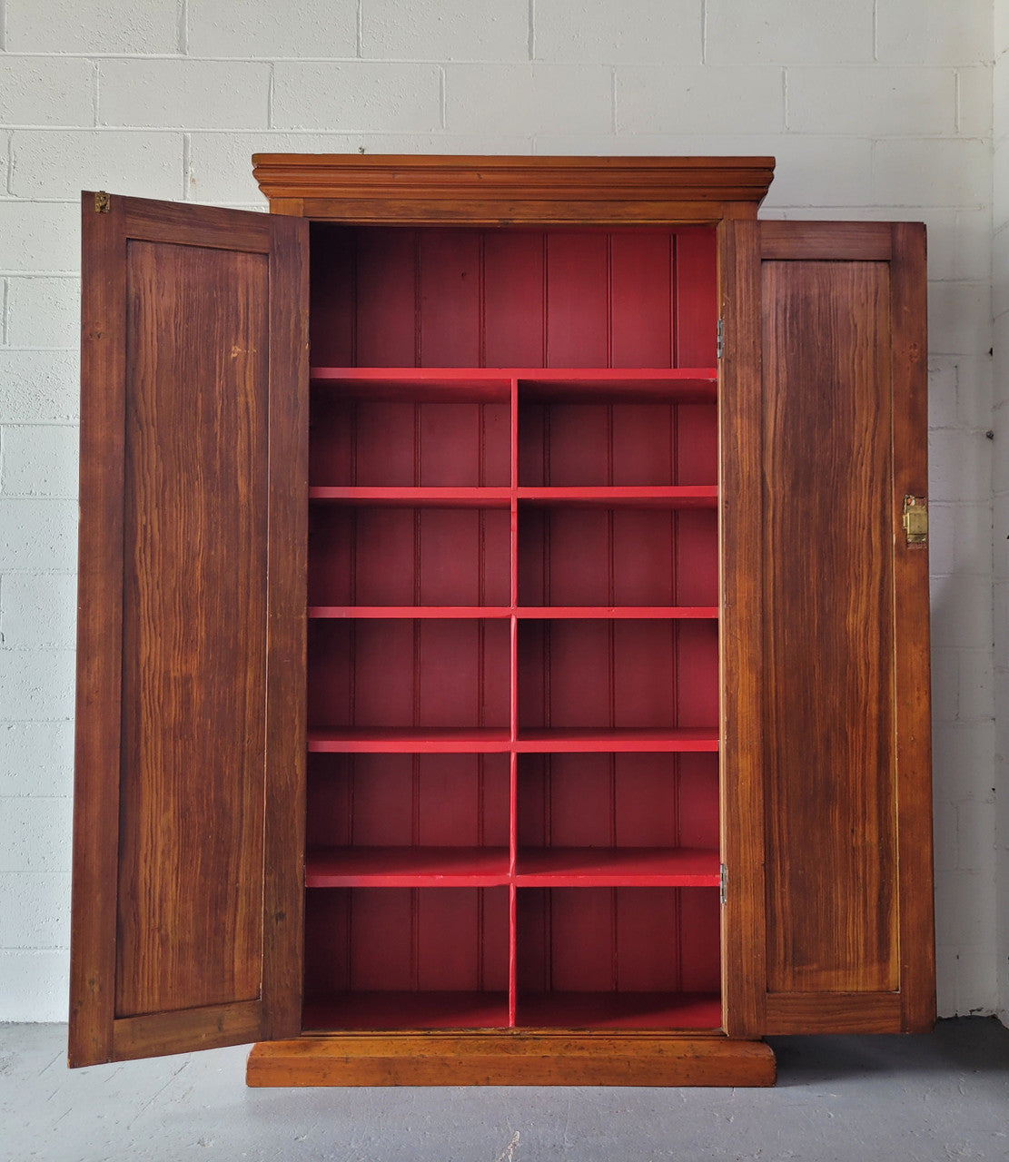 Australian Victorian Pine storage cupboard of pleasing narrow portions. Heaps of storage space and is in very good original detailed condition.