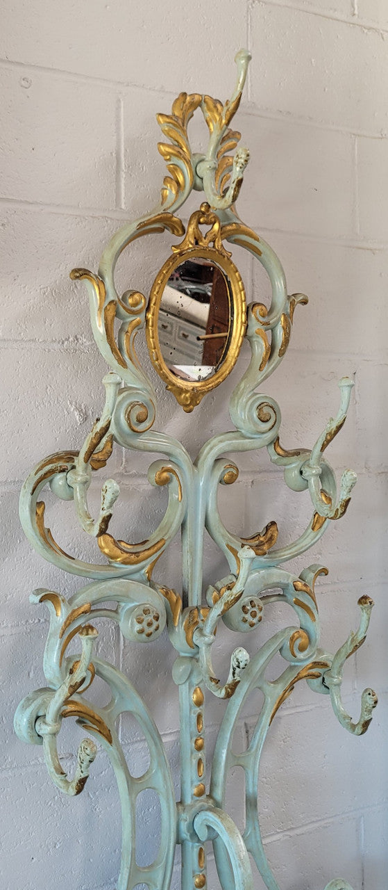 Very attractive 19th Century French cast iron painted and gilded hall stand with original small mirror. Sourced from France and in good original condition.