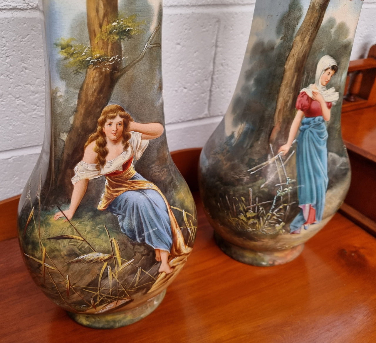 Decorative pair of Victorian hand painted vases. They have been sourced locally and are in good original condition, please view photos as they help form part of the description.