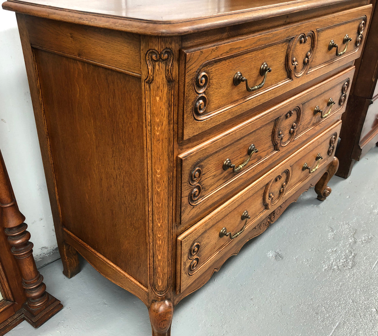 French nicely carved Oak chest of three drawers. In good original detailed condition.