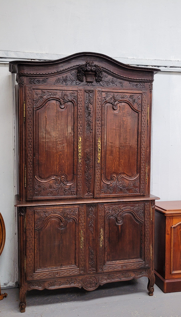 French Oak 18th Century superbly carved sideboard buffet. This amazing buffet has loads of character which is expected being circa 1790's. The top section has two fixed shelves and the bottom section has one fixed shelf. It has been sourced from France and is in good original detailed condition.