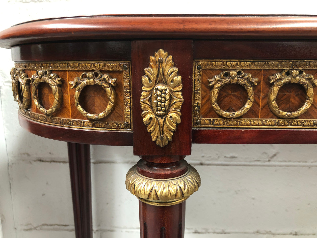 Fully restored decorative French style mahogany console table, with beautiful ormolu mounts and in very good condition.