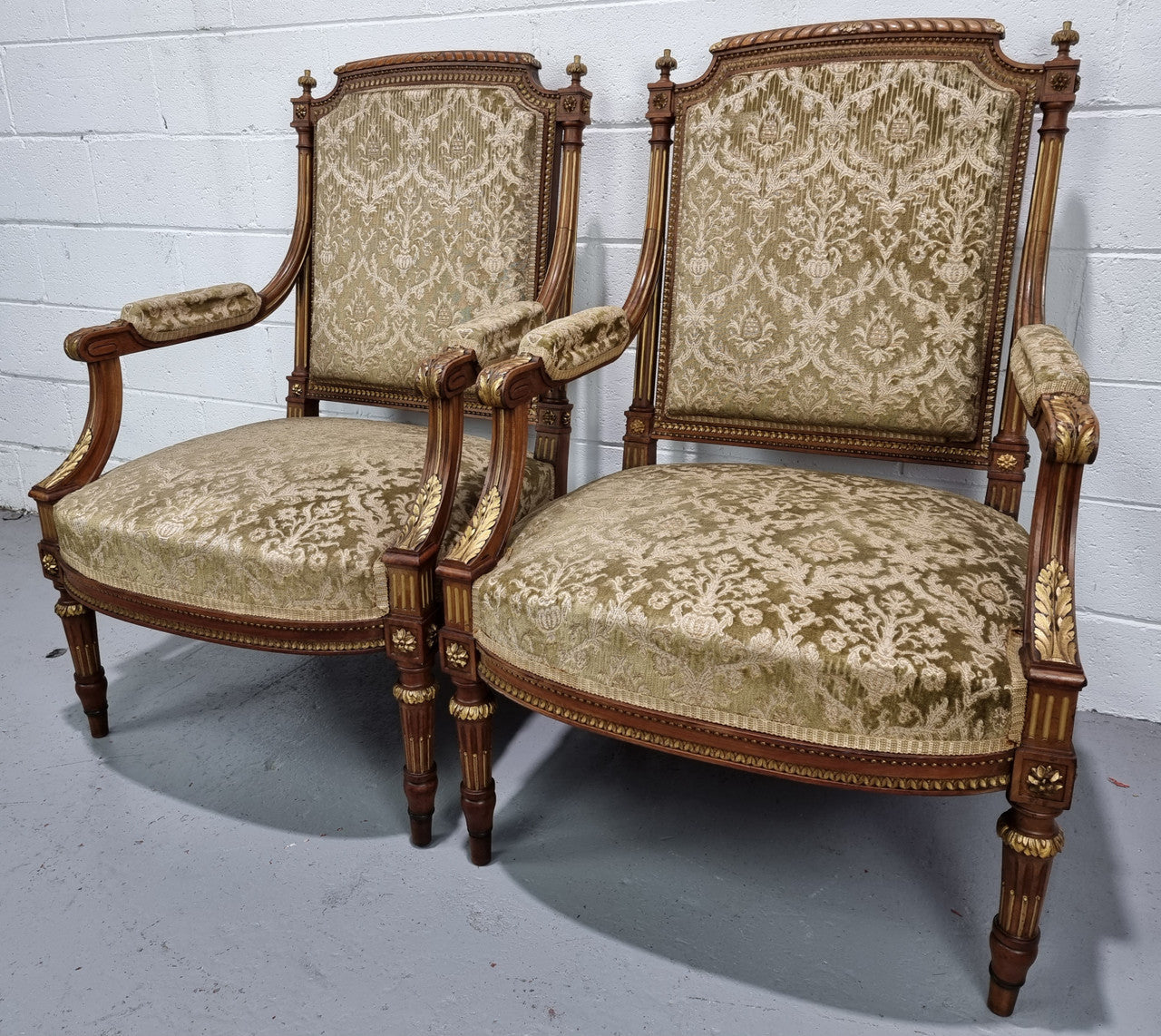 Beautiful French walnut Louis XVI style upholstered three piece Salon Suite. It has lovely fabric which is in overall good condition and is very comfortable to sit in. In good original detailed condition.