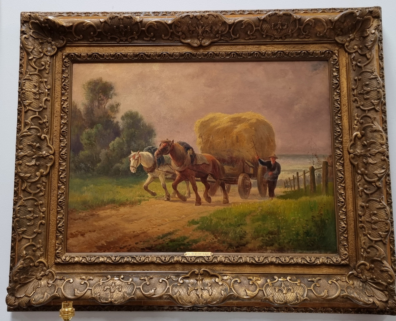Amazing French impressionist oil on canvas of draft horses which is signed and in a lovely ornate frame. In very good original condition.