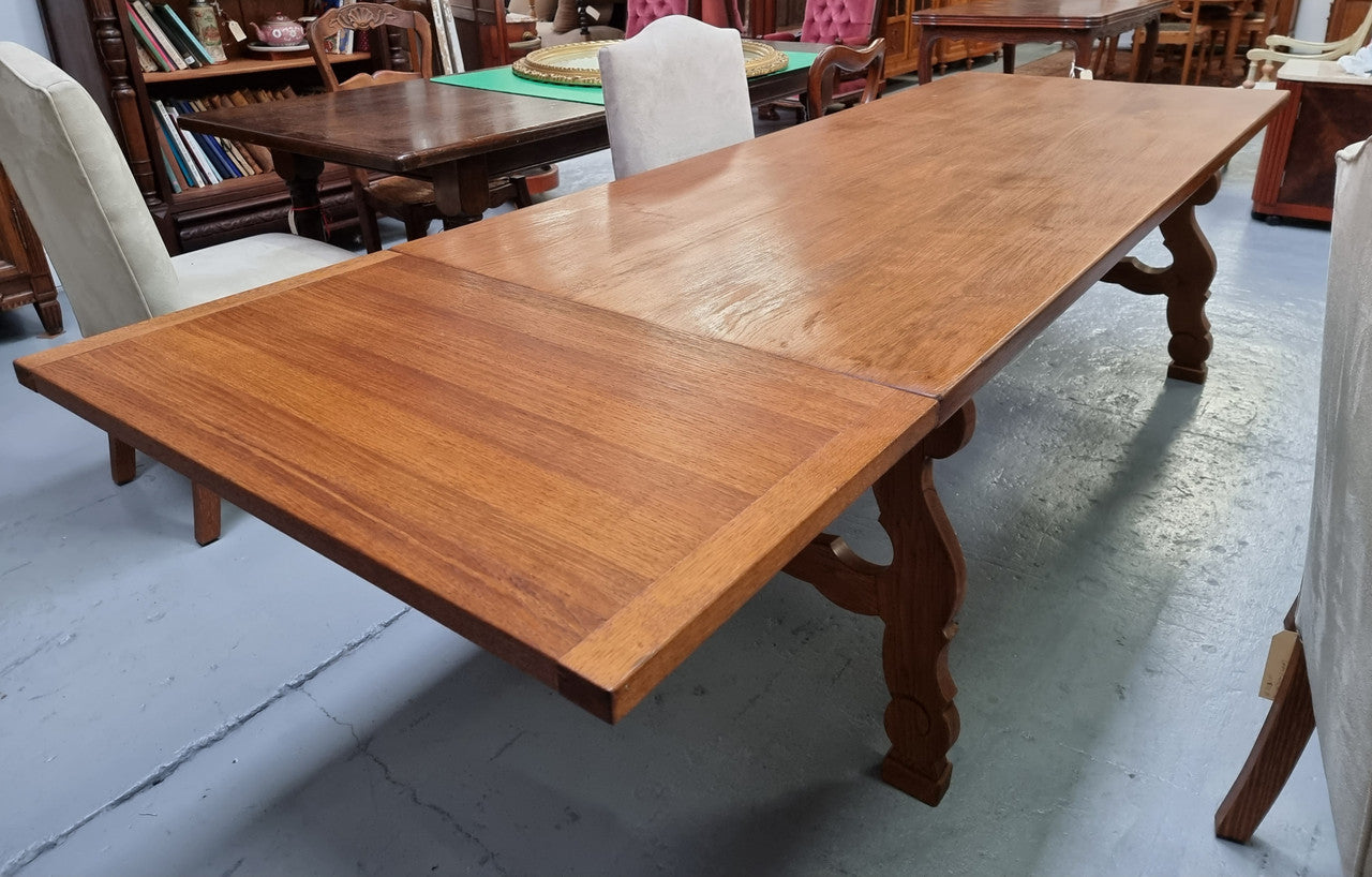 French light Oak Spanish style extension table. In good restored condition.