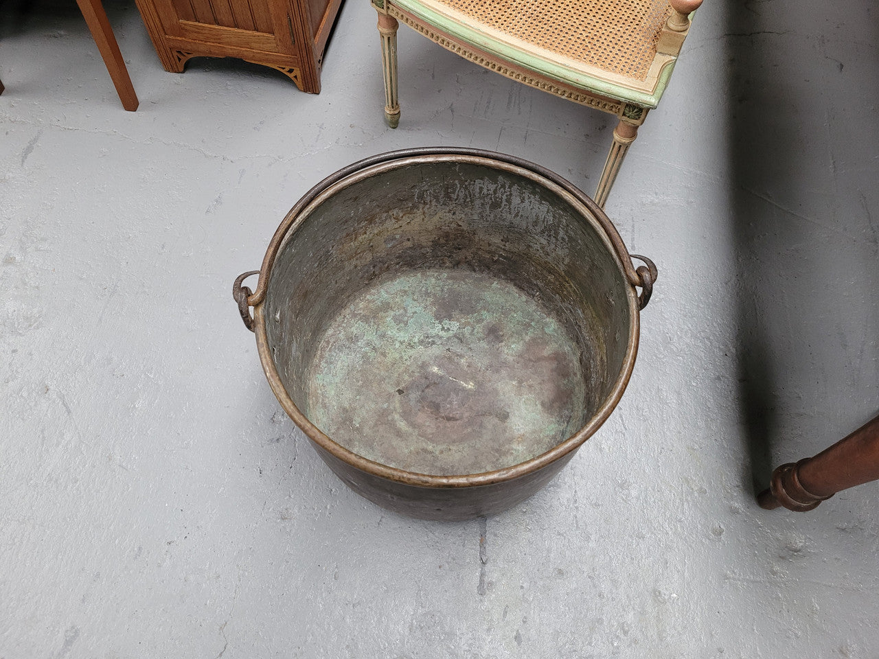 Sourced in France is this large Antique French brass firewood pot with handle. It is in original condition with some signs of wear please view photos.