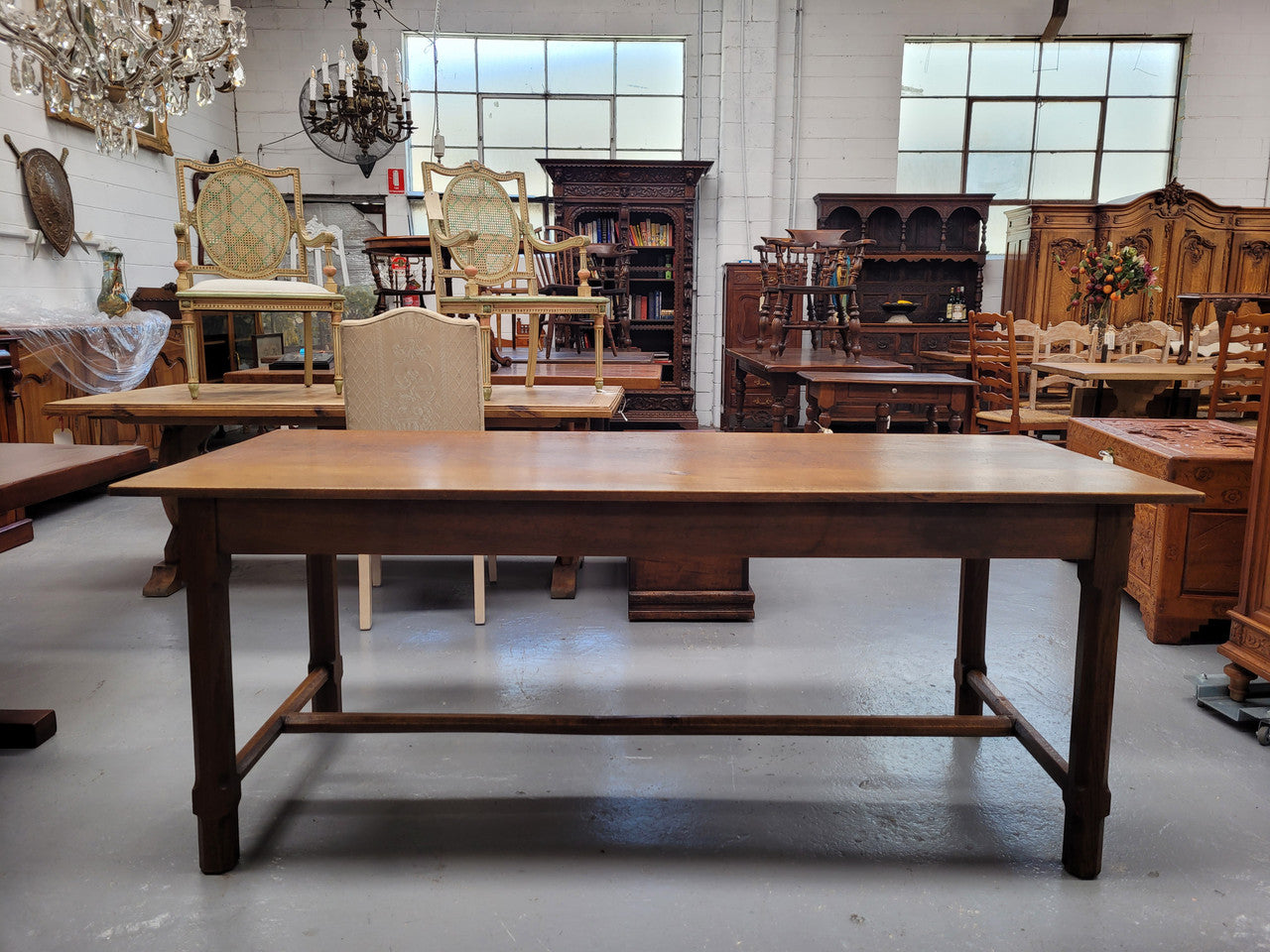 Stunning French oak stretcher base table, that has been sourced from France. It is in good original condition. Please see pictures to form part of the description.