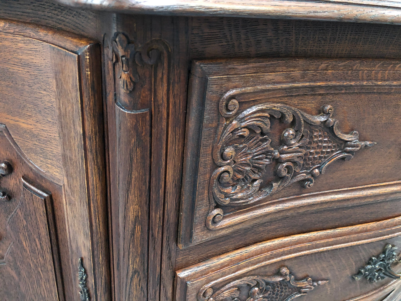 French Louis XV style dark Oak carved, two door and three drawer Commode /side cabinet. Could also be used as a TV cabinet or in the bedroom as storage very versatile. In good original detailed condition.