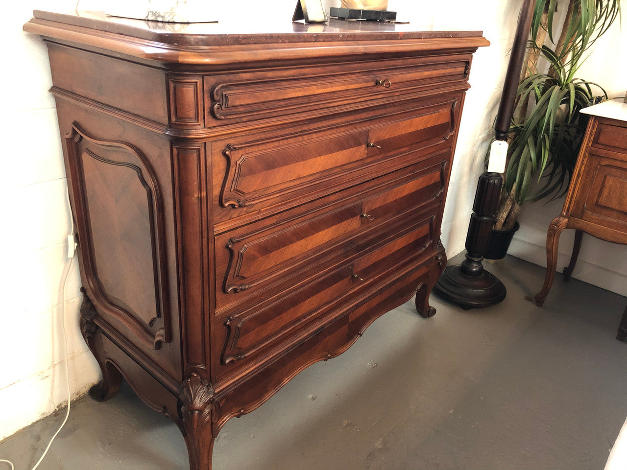 19th Century French Walnut five-drawer marble top commode. In good original detailed condition.