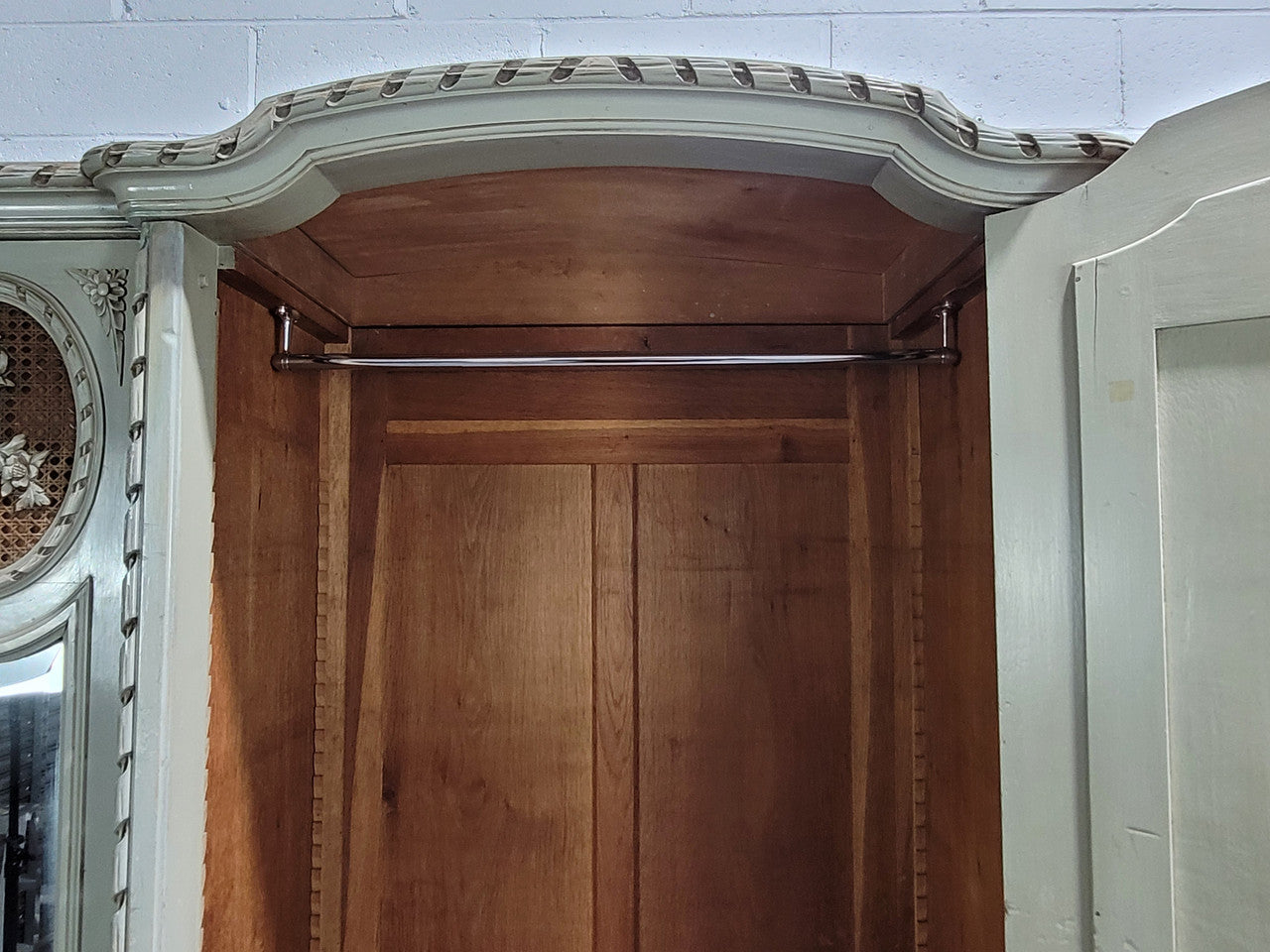 Stunning and desirable Antique French three full length mirror doors, Louis Xl style armoire with original chalk paint finish. With superb carving and decoration. Plenty of storage space with hanging space and shelves.