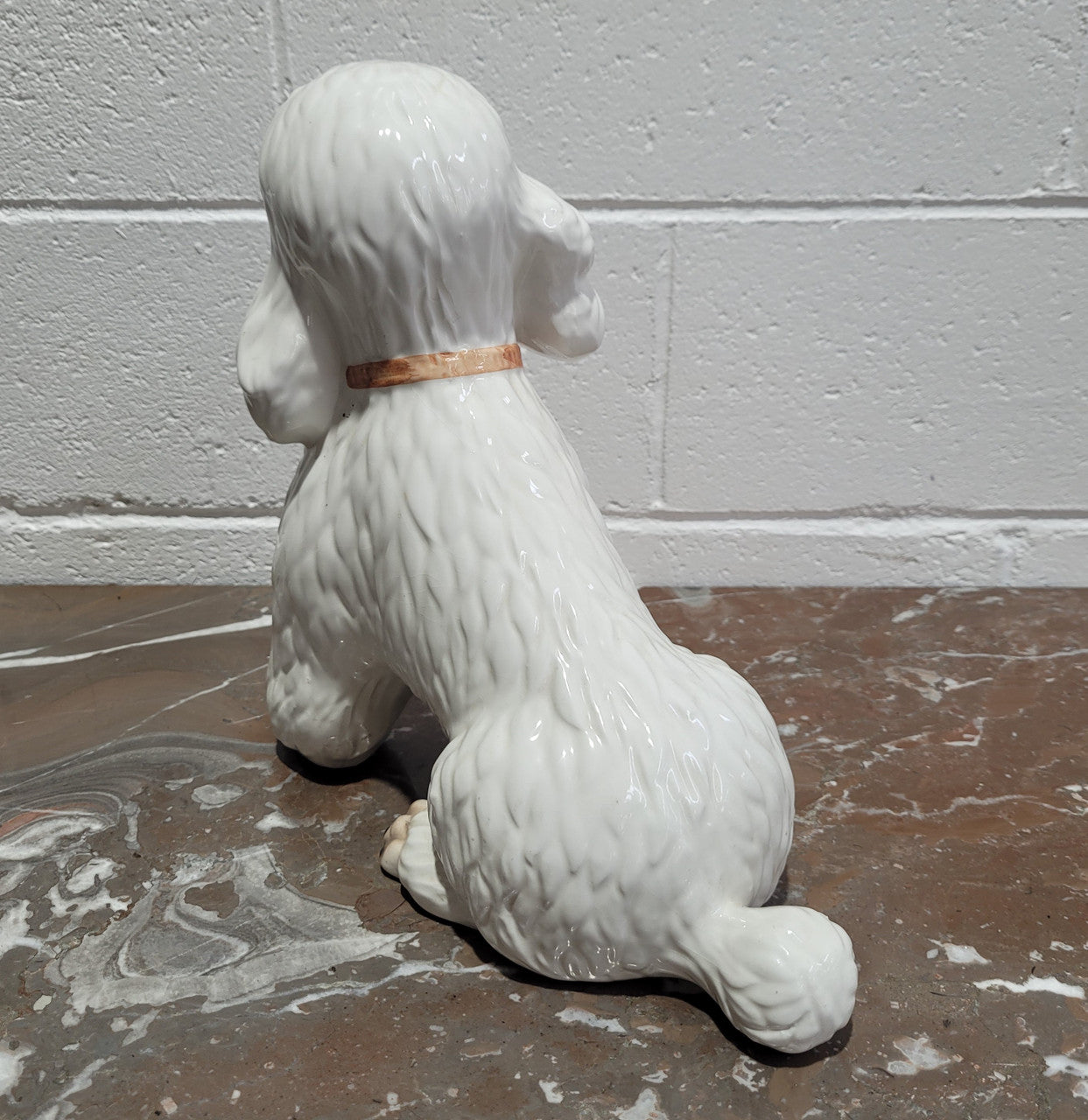 Vintage Italian ceramic Poodle figurine. It is beautifully detailed and in good original condition with no chips or cracks does have crazing to glaze.