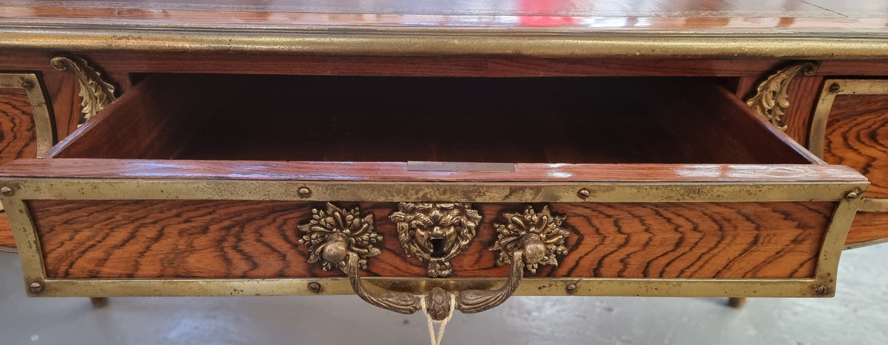 Beautifully fully restored French Antique Rosewood partners desk with beautiful ormolu detail and lovely tooled new leather top. There are three functioning drawers on one side for all your storage needs.