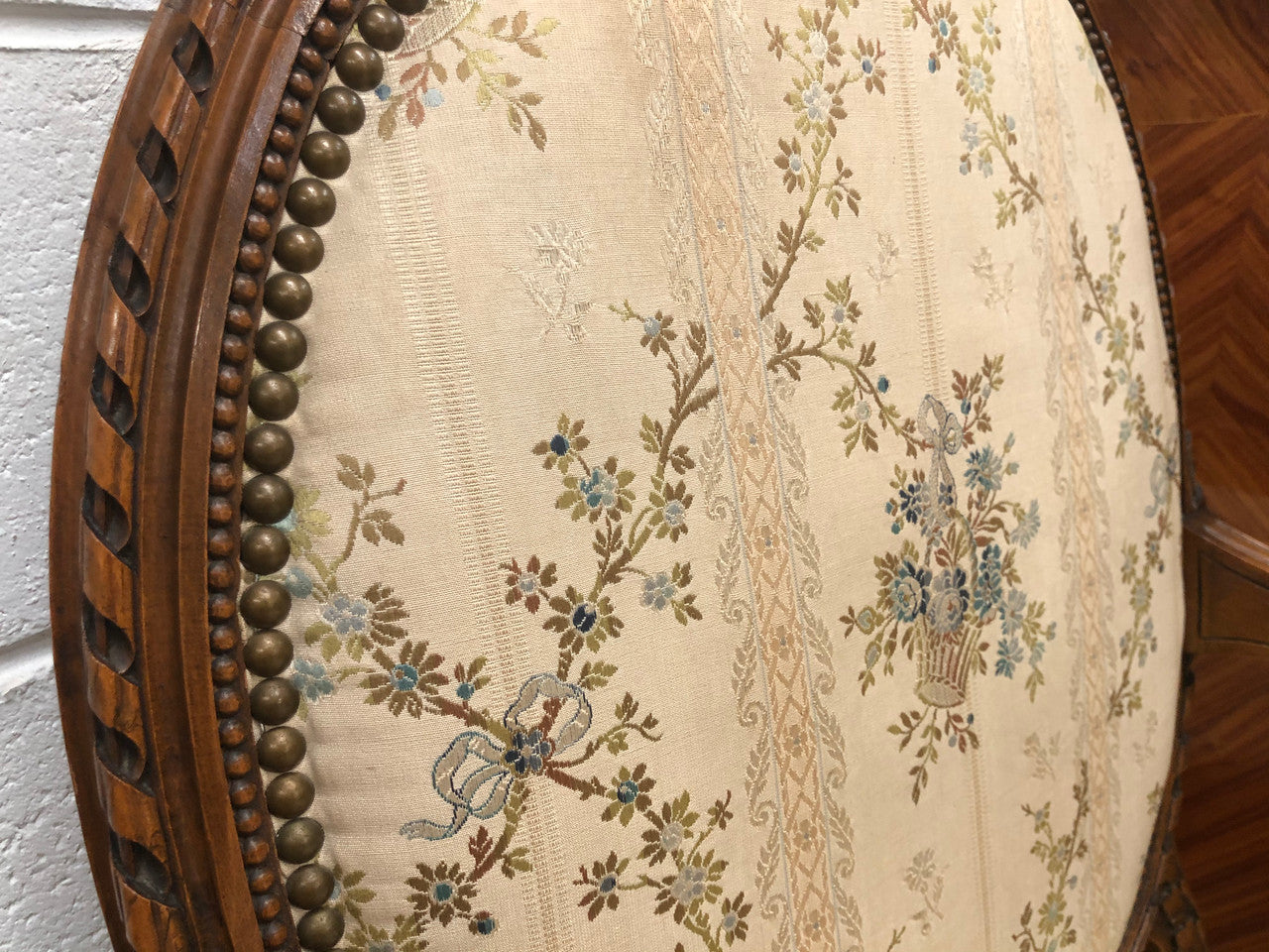 Pair of Antique French Louis XVI style carved Walnut fauteuils in restored condition. The Tapestry upholstery is in good condition some marks and wear but usable.