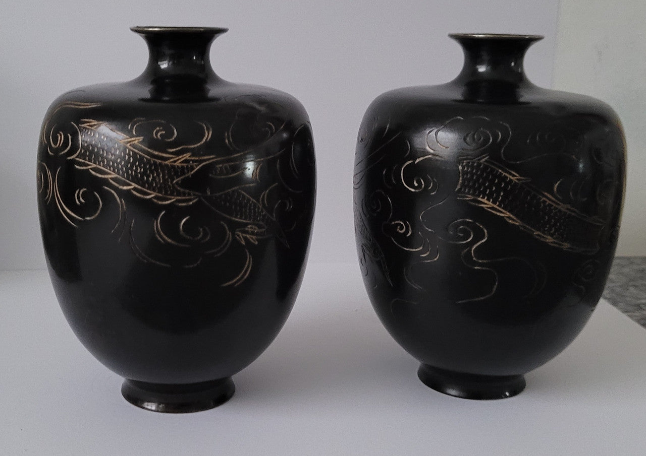 Pair of Antique Meiji Period Japanese etched Bronze vases. It is in good original condition, please view photos as they help form part of the description.