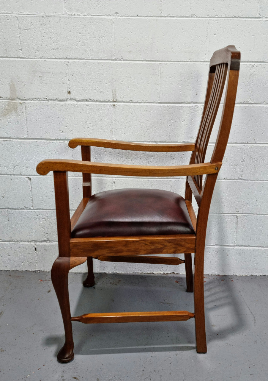 A very comfortable Black Wood Period leather seat armchair. In leather and chair are in good original condition.