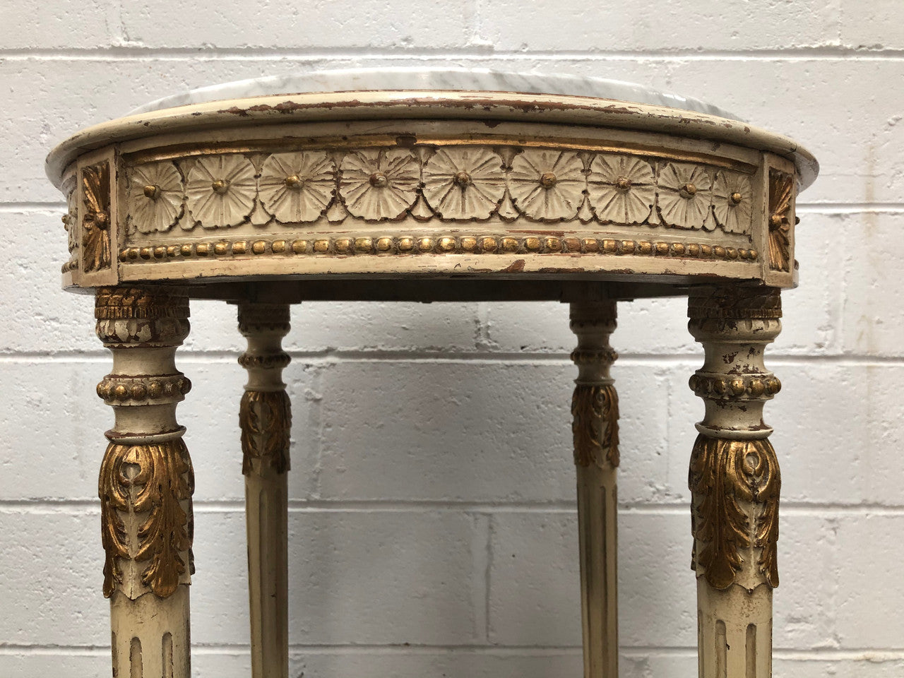 French Late 19th Century painted and gilded Walnut marble top occasional table. In good condition. CIrca 1900.