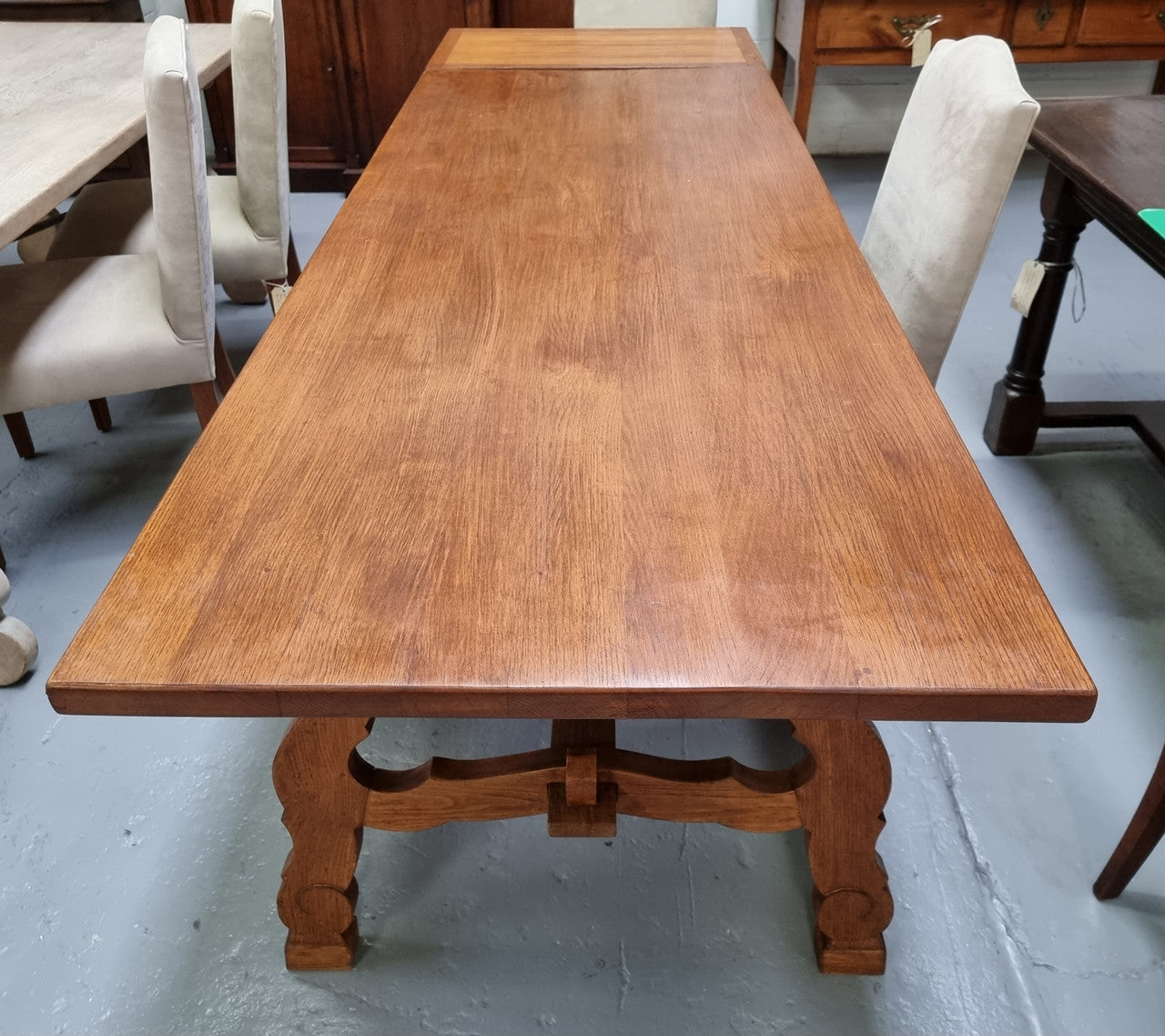 French light Oak Spanish style extension table. In good restored condition.